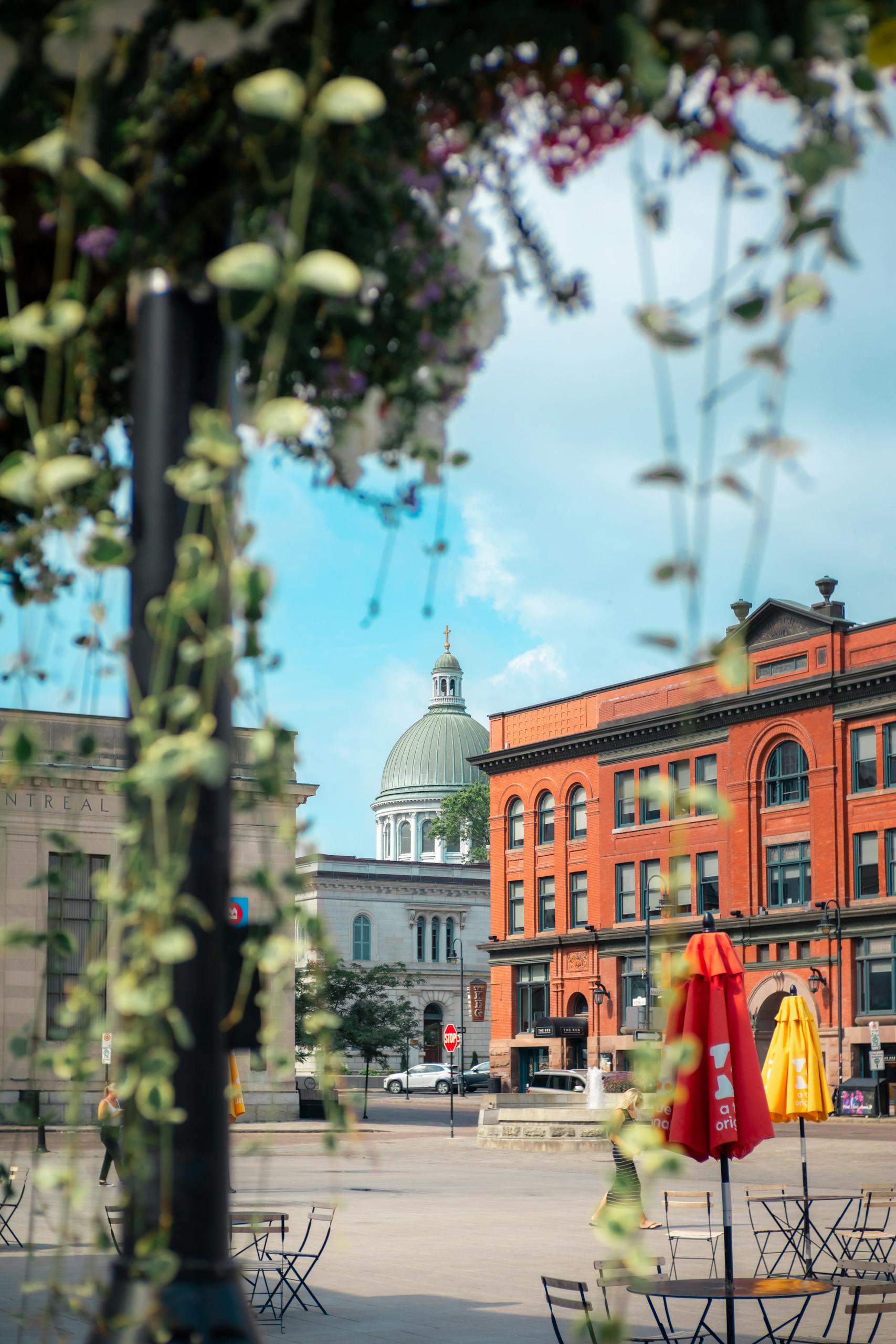 Charming outdoor cafe with views of historical architecture in Kingston, Ontario.